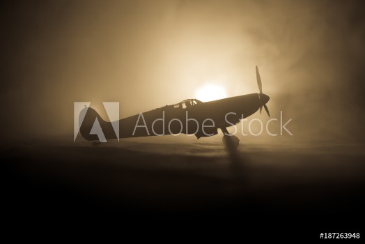 Picture of British jet-propelled model plane in possession Dark orange fire background War scene
